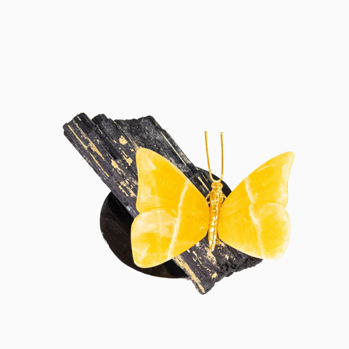 Borboleta Esculpida em Calcita Amarela na Base de Turmalina Negra 1,808 kg
