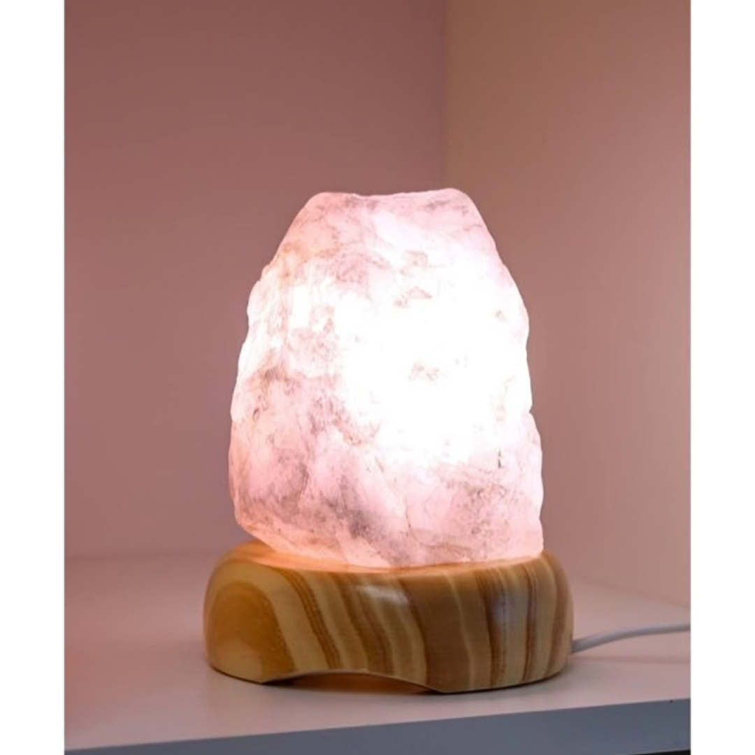 Raw Rose Quartz Lamp on Light Wood Base